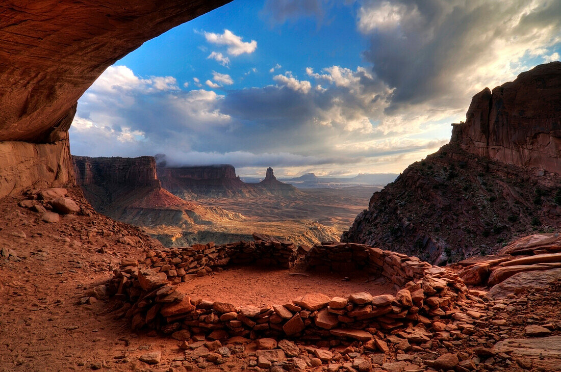 An afternoon storm clears at False Kiva in Canyonlands National Park, Utah Canyonlands National Park, Utah, USA