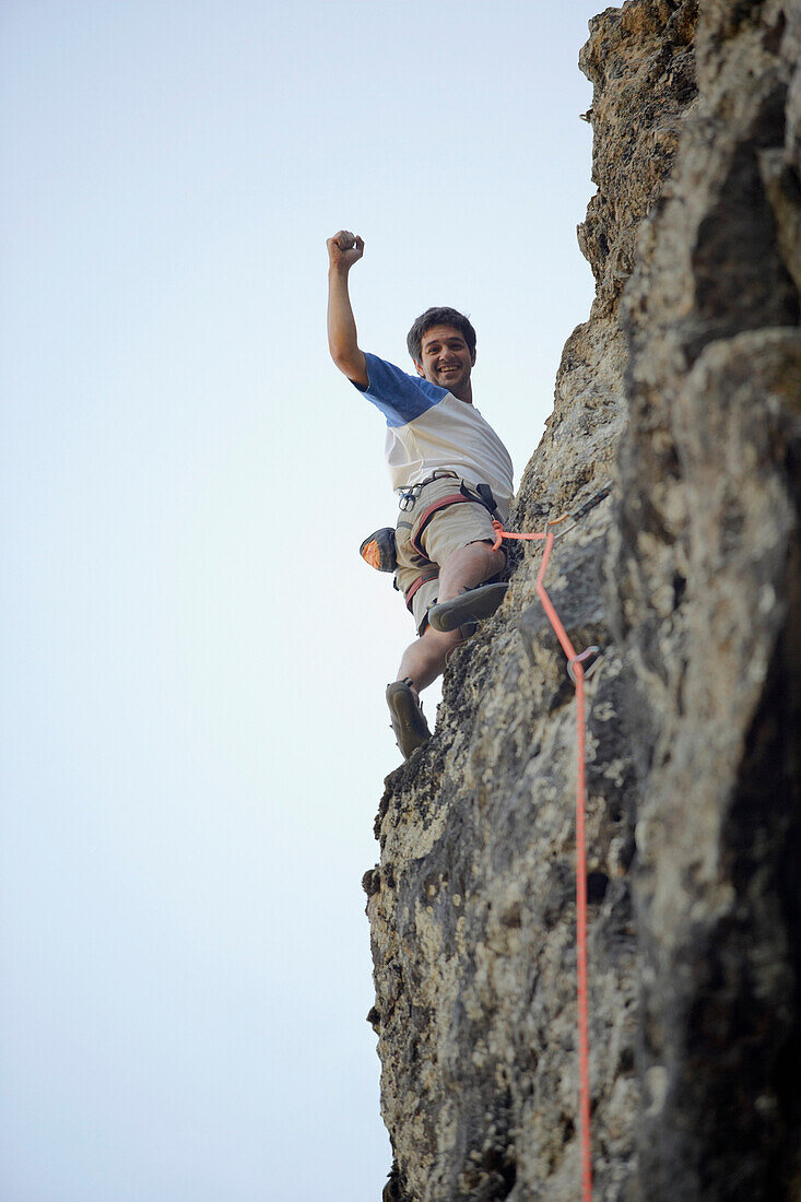 Argentinean man rock climbing, Bariloche, Argentina
