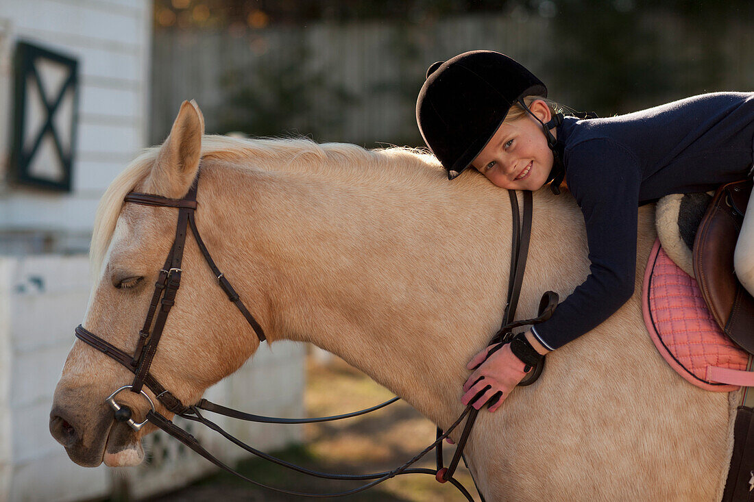 Caucasian girl riding on horse, Manakin, VA, Goochland