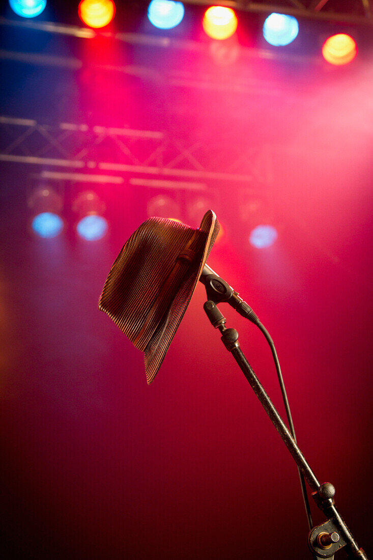 Fedora hanging on microphone on stage, Rockville, Maryland, USA