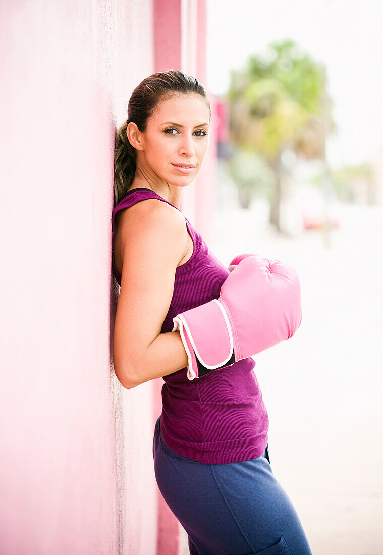 Hispanic woman in boxing gloves, Miami, Florida, United States
