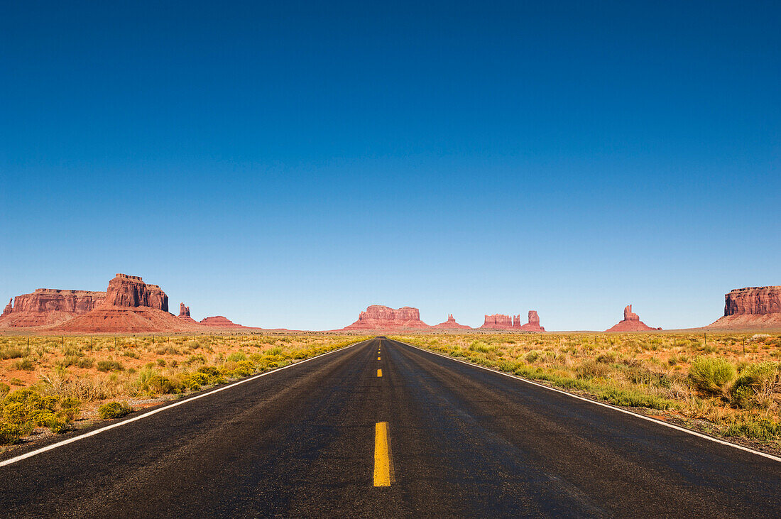 Highway and rock formations in desert, Kayenta, Arizona, United States