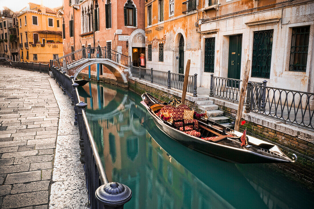 Gondola moored in canal, Venice, Venezia, Italy
