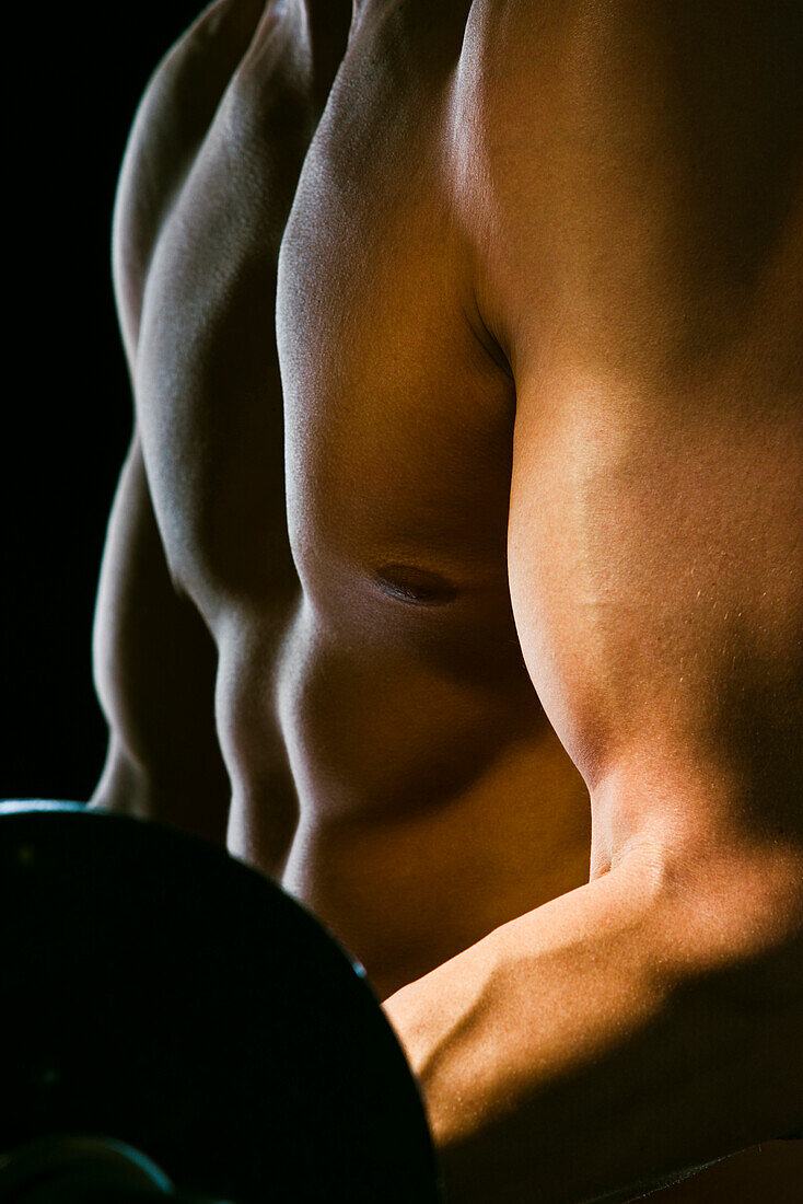 Caucasian man exercising with barbells, Saint Louis, Missouri, United States