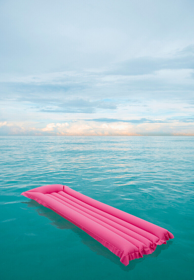 Inflatable raft floating in tropical water, Miami Beach, Florida, United States