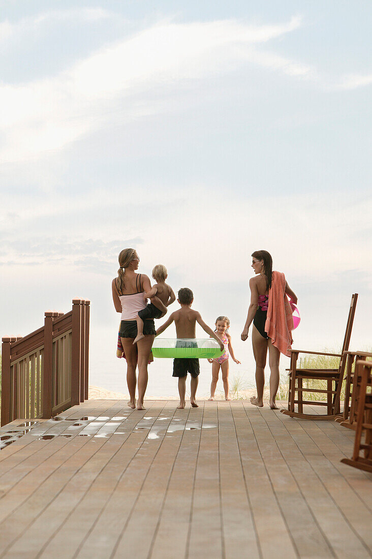 Family walking towards the beach, Norfolk, VA