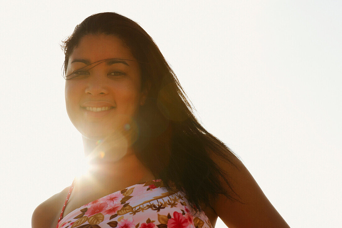 Hispanic woman in sunlight, Cape Cod, MA