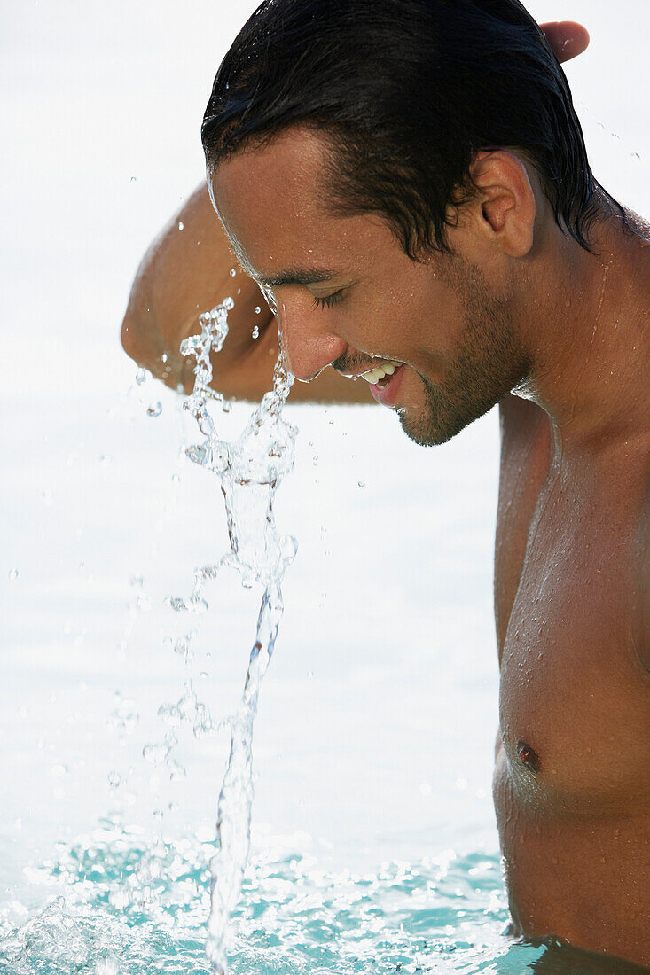 South American man in water, Morrocoy, Venezuela