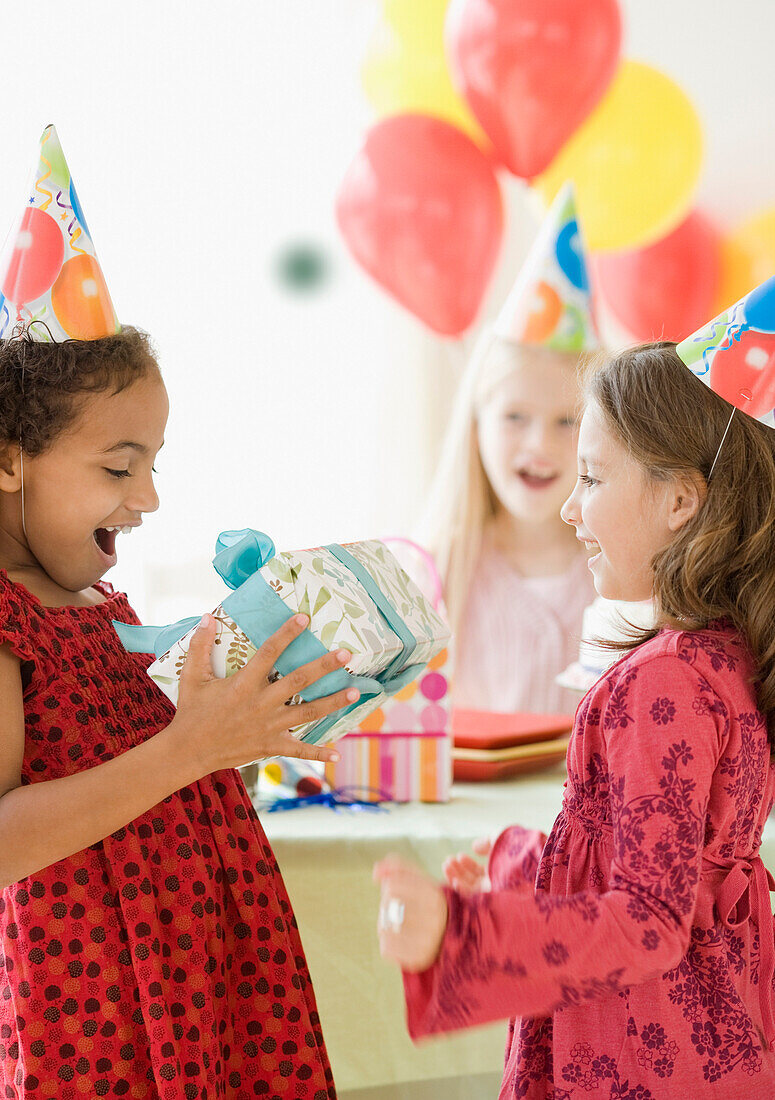 Multi-ethnic girls at birthday party, Jersey City, NJ