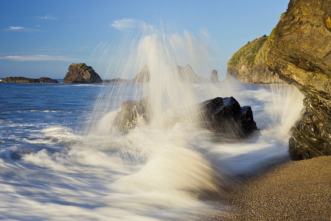 Waves crashing onto the beach at Ship Creek, West Coast, Tasman Sea, South Island, New Zealand
