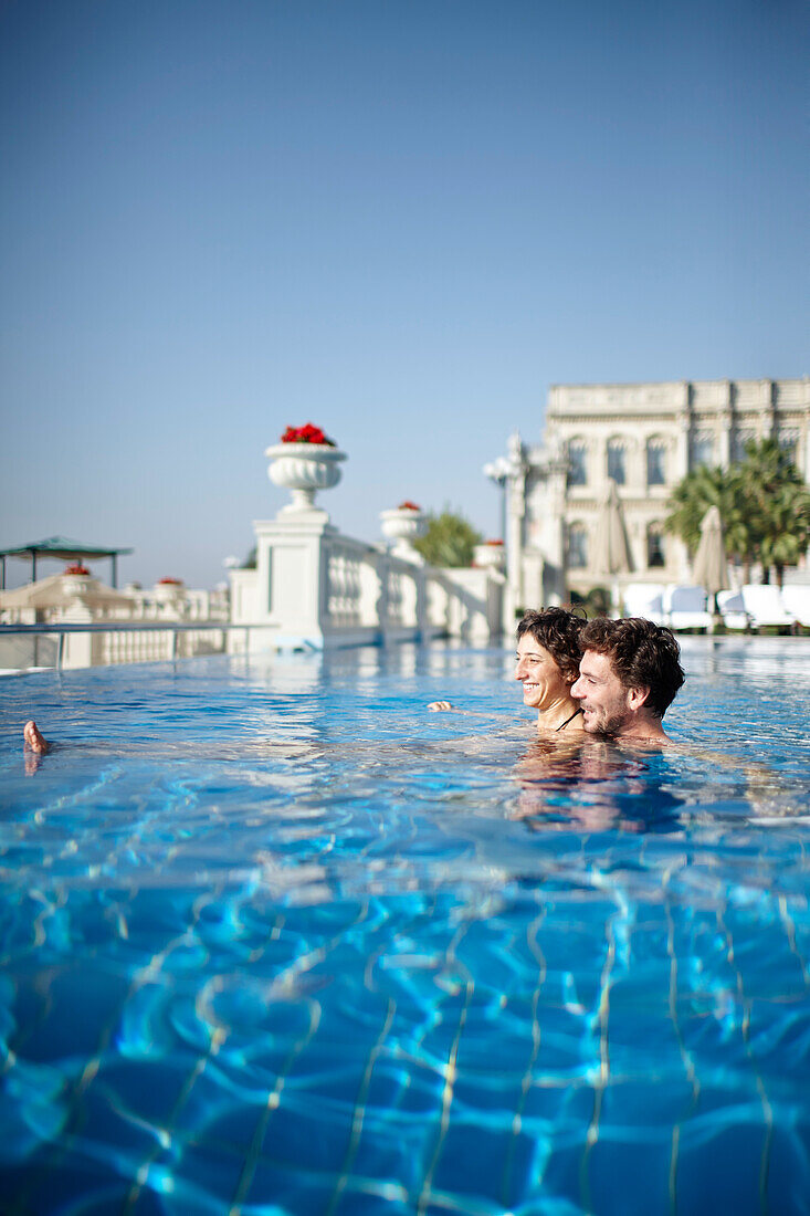 Couple in a hotel pool, Istanbul, Turkey
