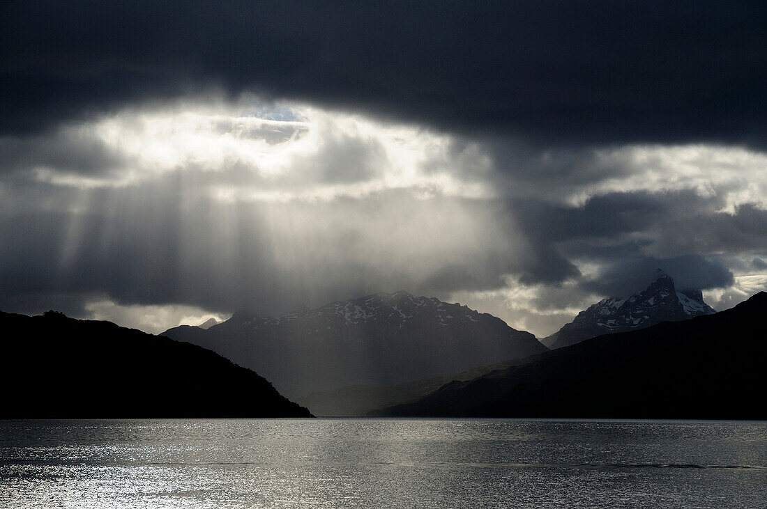 Caleta Escandallo in backlight, Martinez fjord, Tierra del Fuego, Chile
