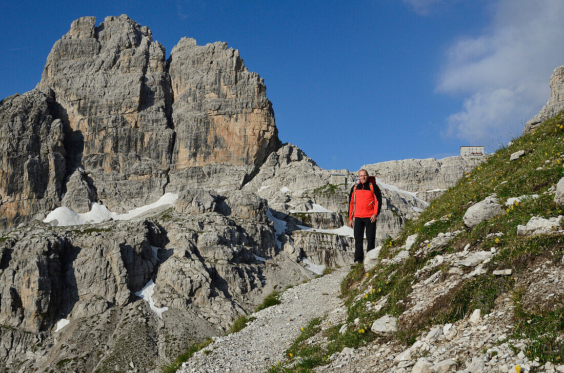 Hiker near Rifugio Pedrotti, Brenta Dolomites, Trentino, Italy