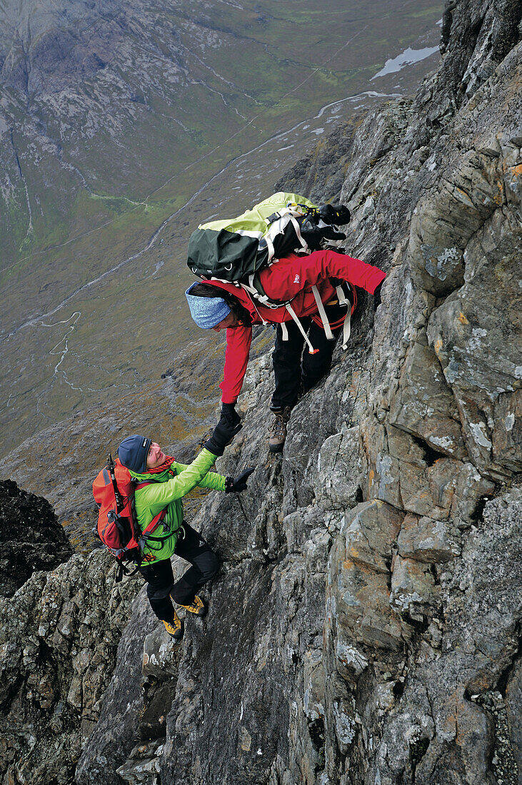 Climbers at pinnacle ridge, Sgurr nan Gillean, Cuillin, Isle of Skye, Scotland, Great Britain