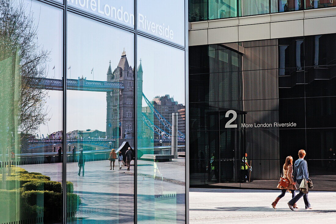 Reflection of Tower bridge in a facade of the office building of More London Riverside, Southwark, London, England, United Kingdom