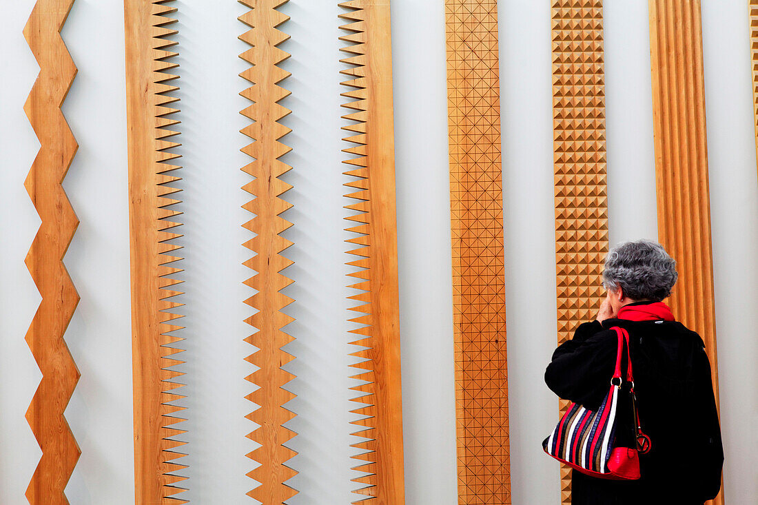 Woman looking at the piece From Surface to Surfacefrom the year 1971 by artist Susumu Koshimizu, Tate Modern, London, England, United Kingdom