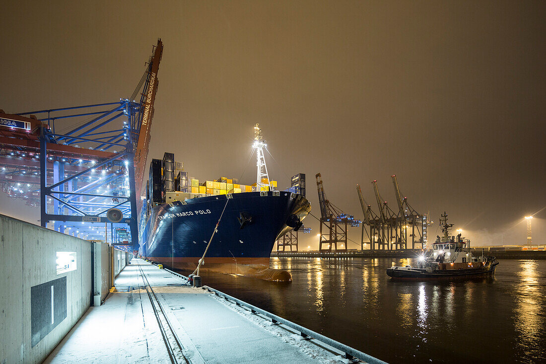Docking maneuver of the CMA CGM Marco Polo in the Container Terminal Burchardkai in Hamburg, Germany