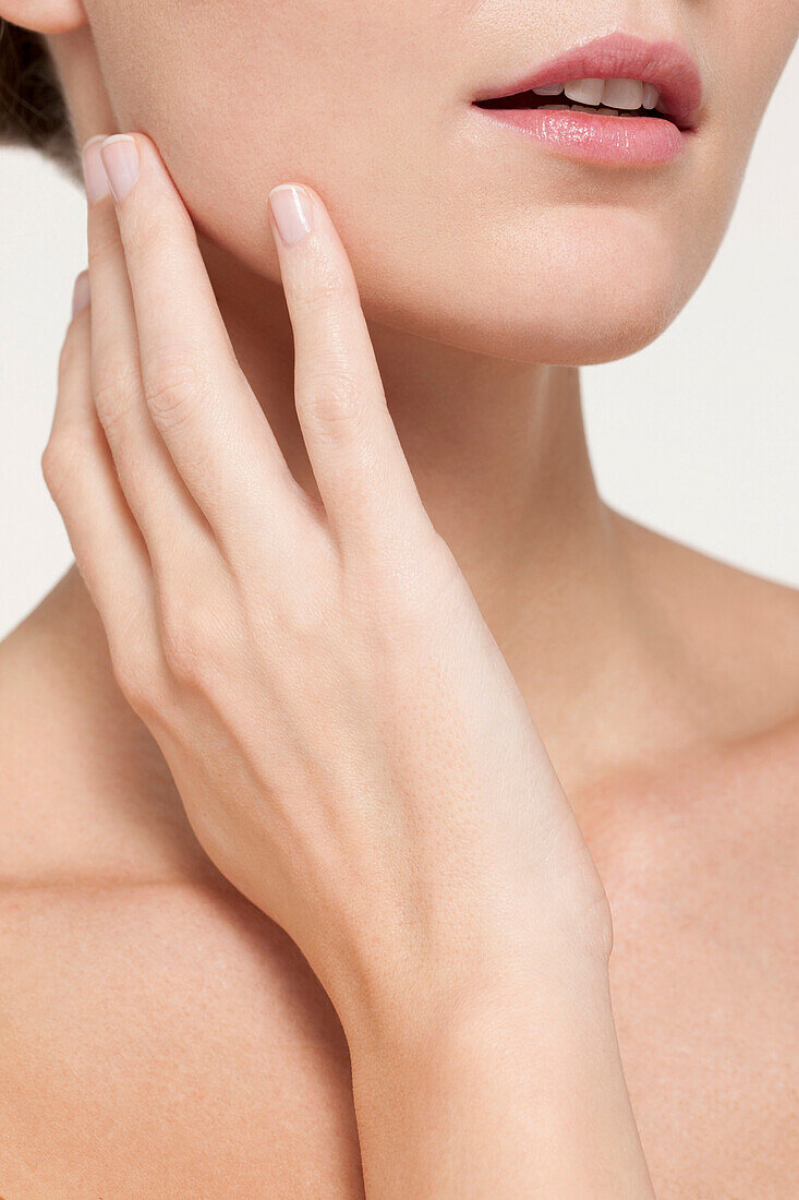 Nude Caucasian woman touching her jaw, Tilburg, North-Brabant, Netherlands