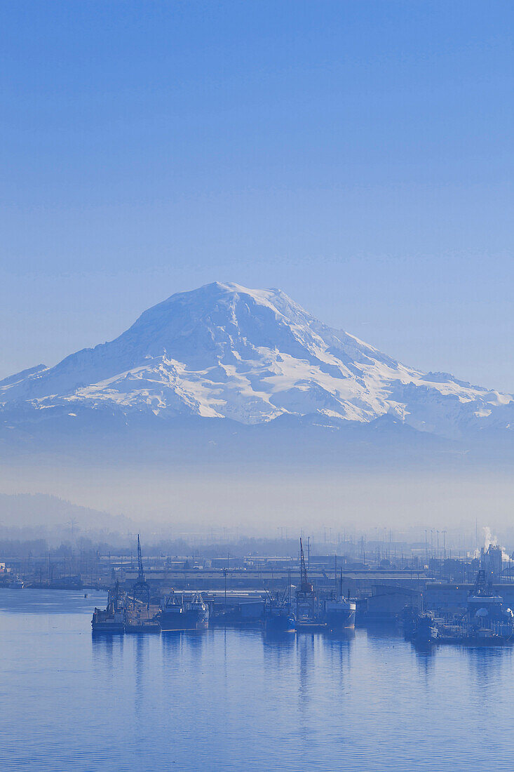 Winter smog rising over the industrial area of Tacoma, Tacoma, Washington, USA