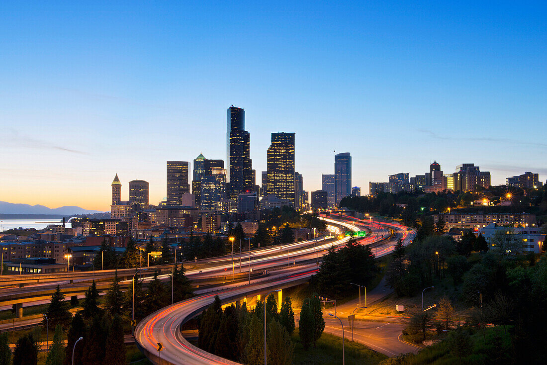 Freeways and Seattle skyline at sunset, Seattle, Washington, United States, Seattle, Washington, Usa