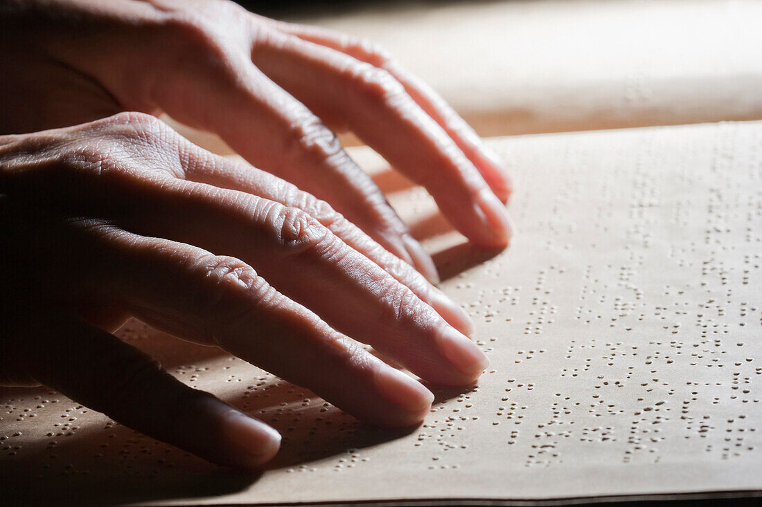 Close up of Hispanic person reading Braille, Vina del Mar, Valparaiso, Chile