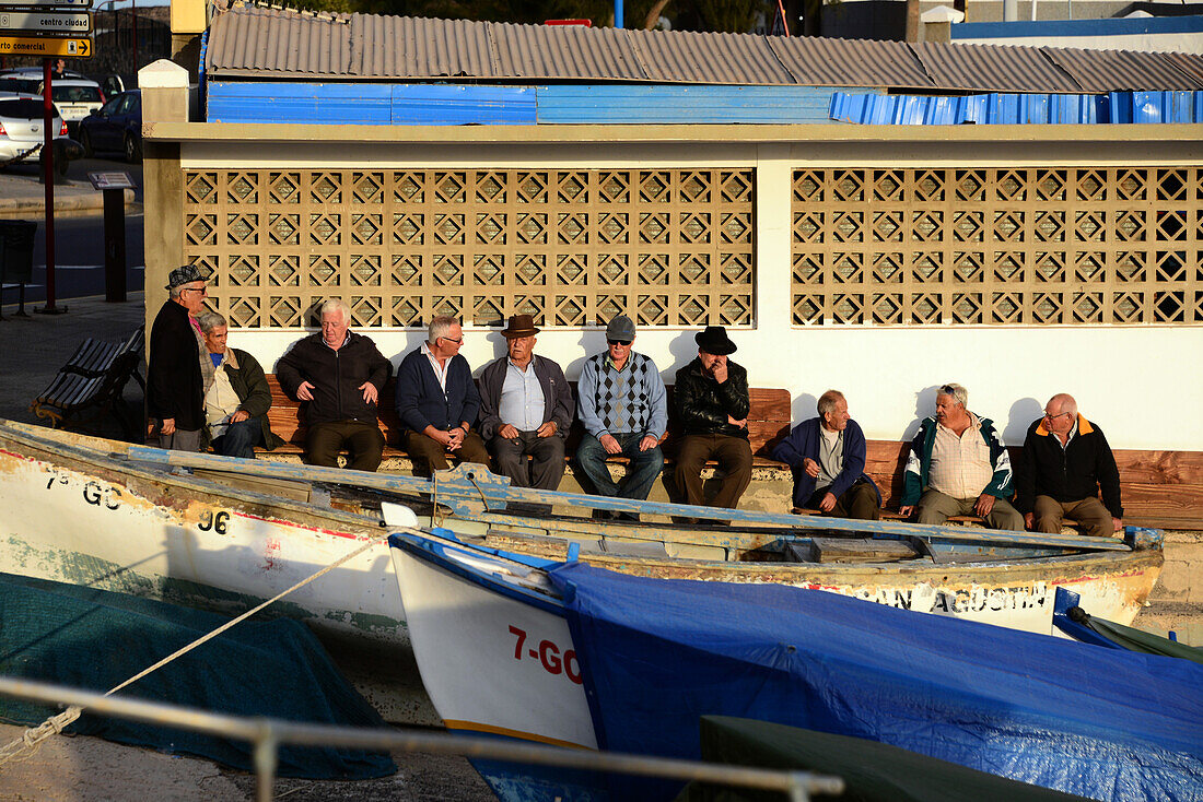 Men at quay, Puerto del Rosario, Fuerteventura, Canary Islands, Spain