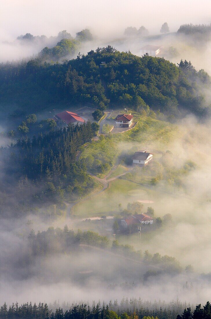 Fog. Basque Farmhouse. Aizkorri Aratz Natural Park. Aloña mount. Arantzazu. Oñati. Gipuzkoa. Basque Country. Spain.