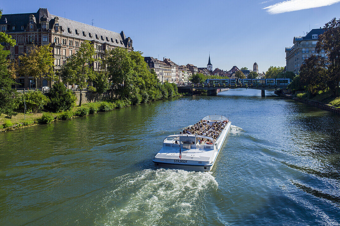Sightseeing tour boat on Ill river Strasbourg Alsace France.