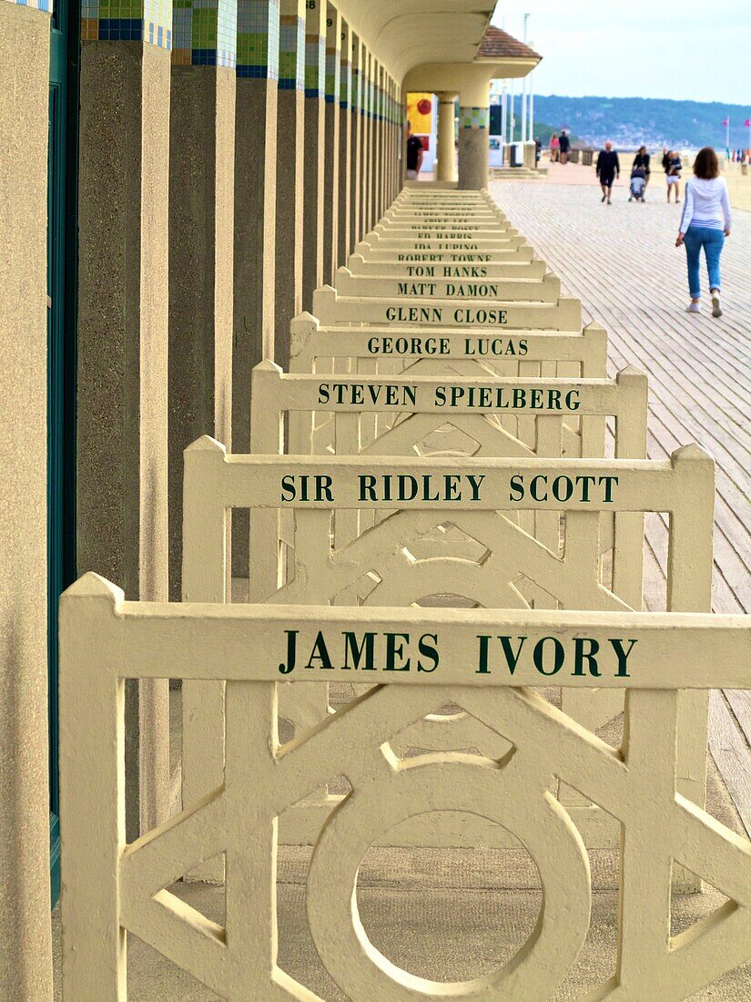 the famous Planches and the cabins of the Pompeian Baths with american actors' names painted, Deauville, Calvados, France.