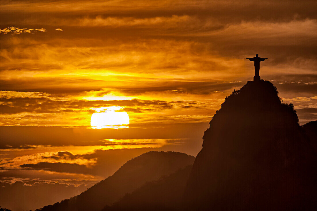 Statue of Christ on the top of Corcovado Hill at sunset, Rio de Janeiro, Brasil, South America