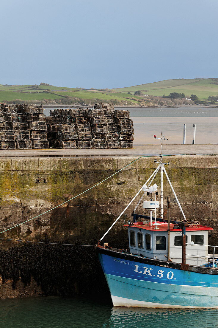 Lobster cages, fishing boat and quay, Harbour, Padstow, Cornwall, England, Great Britain