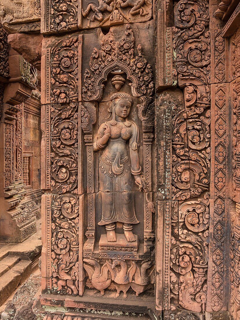 'Banteay Srei or Banteay Srey is a 10th century Cambodian temple dedicated to the Hindu god Shiva. Located in the area of Angkor in Cambodia. It lies near the hill of Phnom Dei, 25 km (16 mi) north-east of the main group of temples that once belonged to t