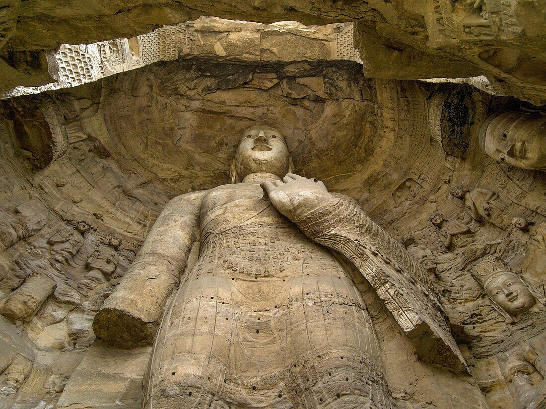 The Yungang Grottoes (Wuzhoushan Grottoes in ancient time) are ancient Chinese Buddhist temple grottoes near the city of Datong in the province of Shanxi. They are excellent examples of rock-cut architecture and one of the three most famous ancient Buddhi