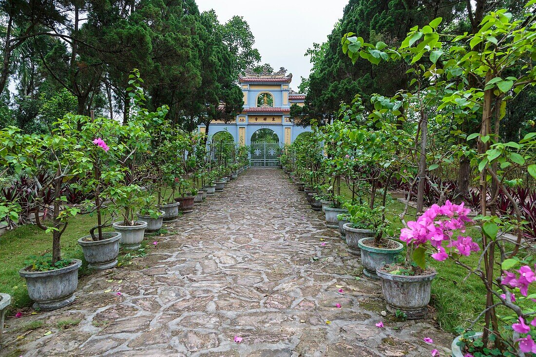 Pagoda gate and garden at the Dong Thuyen Pagoda and Monastery in Hue, Vietnam, Asia.