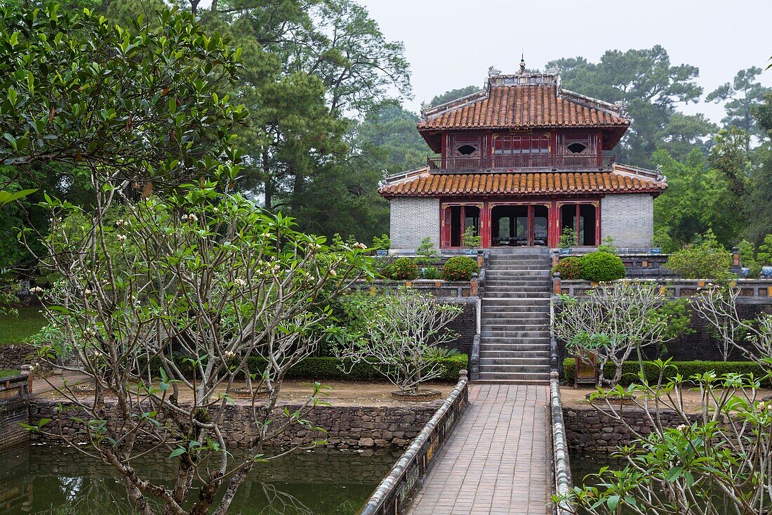The Ming Mang Tomb complex of gates, buildings and statues near Hue, Vietnam, Asia.