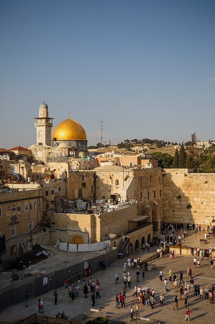 View over the wailing wall known also as the western wall and the Dome of the Rock mosque, Jerusalem, Israel.