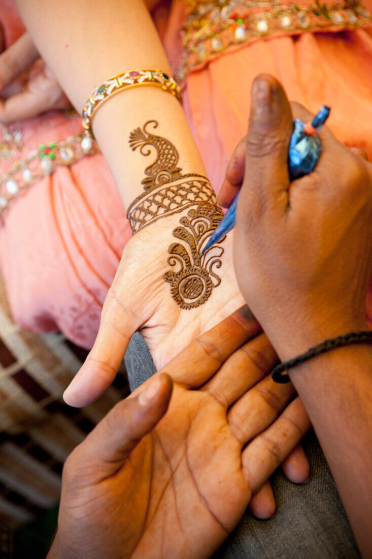 'Mehndi Being Put On A Woman's Hand; Ludhiana, Punjab, India'