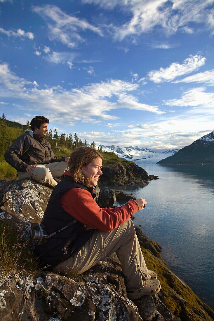 Man And Woman Looking Across Harriman Fjord Pws Southcentral Alaska Summer