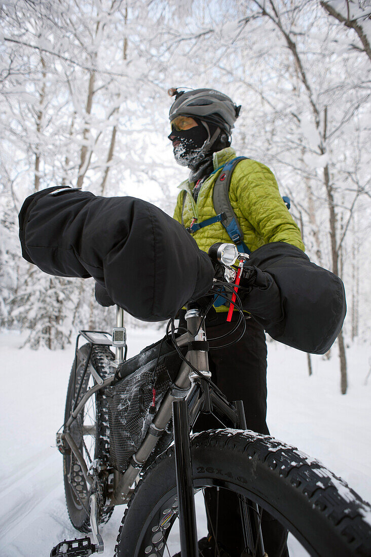 Male Bicyclist In Cold Weather Gear With His Fat Tire Snow Bike, Far North Bicentnnial Park, Anchorage, Southcentral Alsaka, Winter