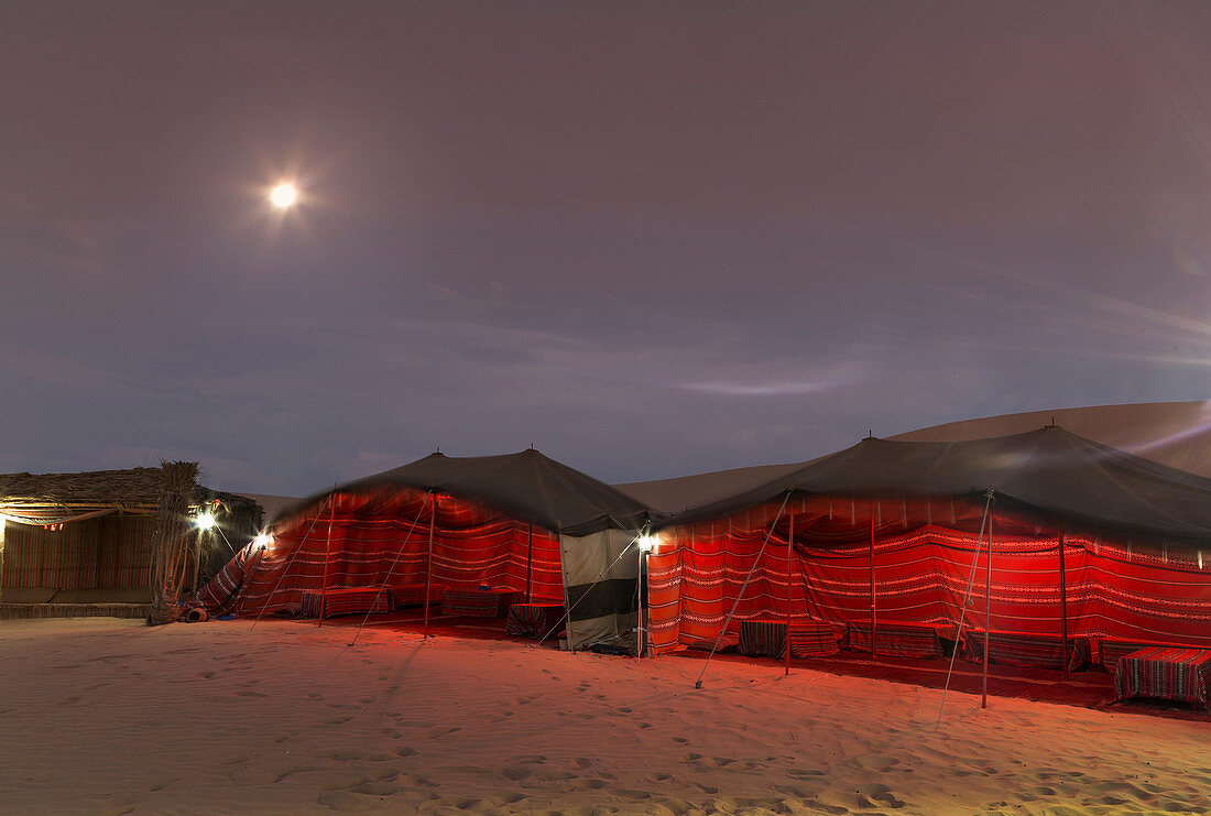 Bedouin tents at night in desert, Adu Dhabi, United Arab Emirates