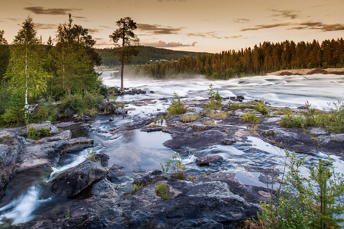 View of river flowing over rocks, Storforsen, Lapland, Sweden