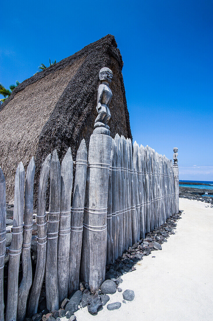 Wooden statues on the royal grounds  in Puuhonua o Honaunau National Historical Park, Big Island, Hawaii, United States of America, Pacific