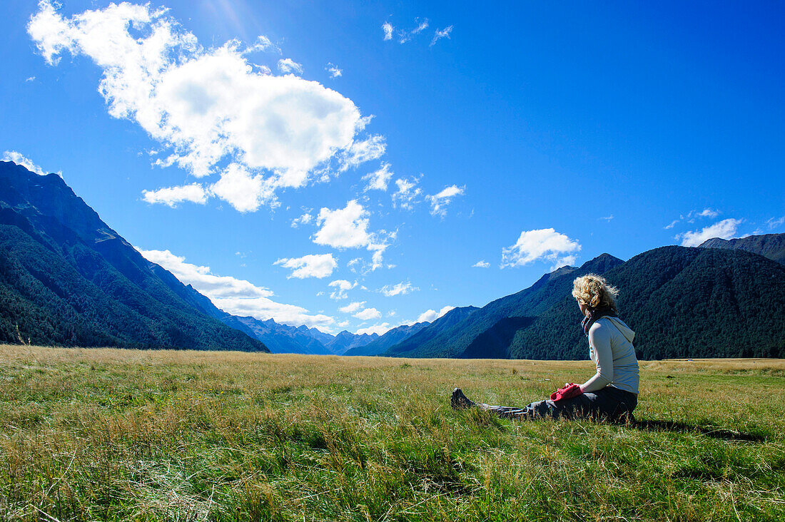 Tourist enjoying Eglinton Valley before the Milford Sound, South Island, New Zealand, Pacific