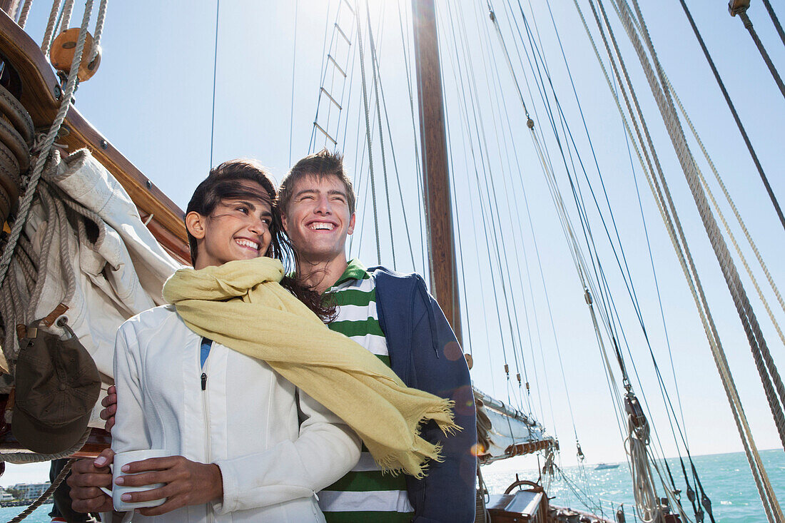 Caucasian couple on sailboat, Cape Town, Western Cape, South Africa