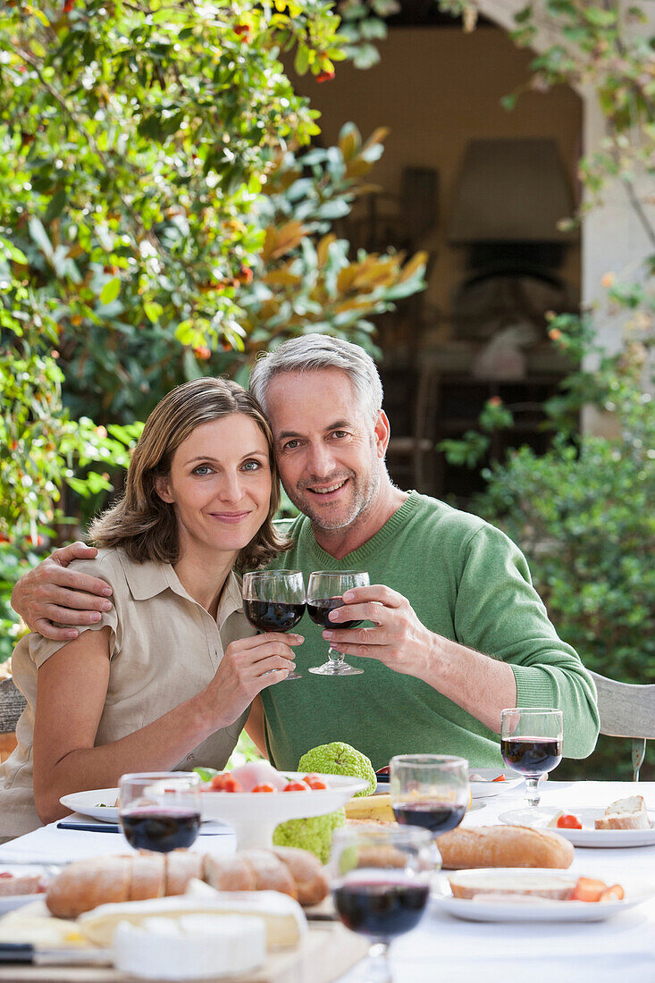 Couple eating together outdoors, Palma de Mallorca, Balearic Islands, Spain