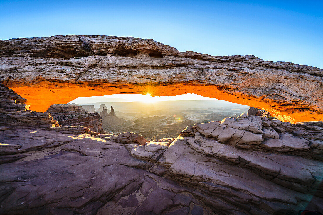 Sun rising over mesa arch, Canyonlands, Utah, United States, Canyonlands, Utah, United States