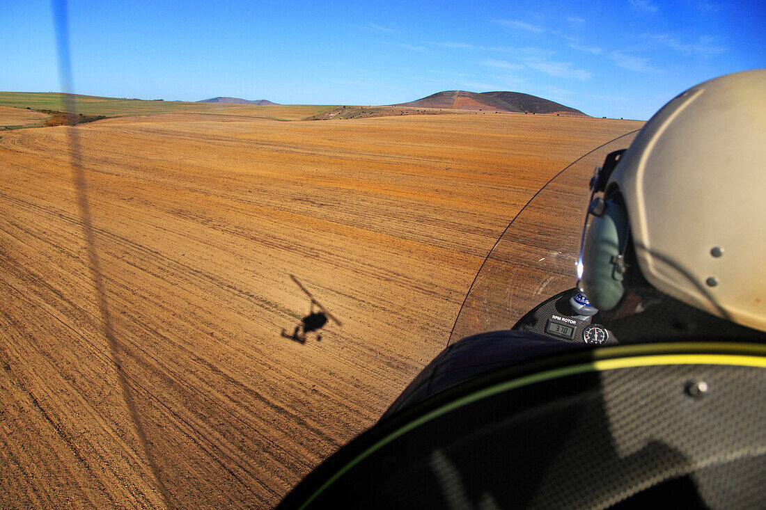 South Africa. Aerial view. Cape Town. Gyrocopter flying above fields.