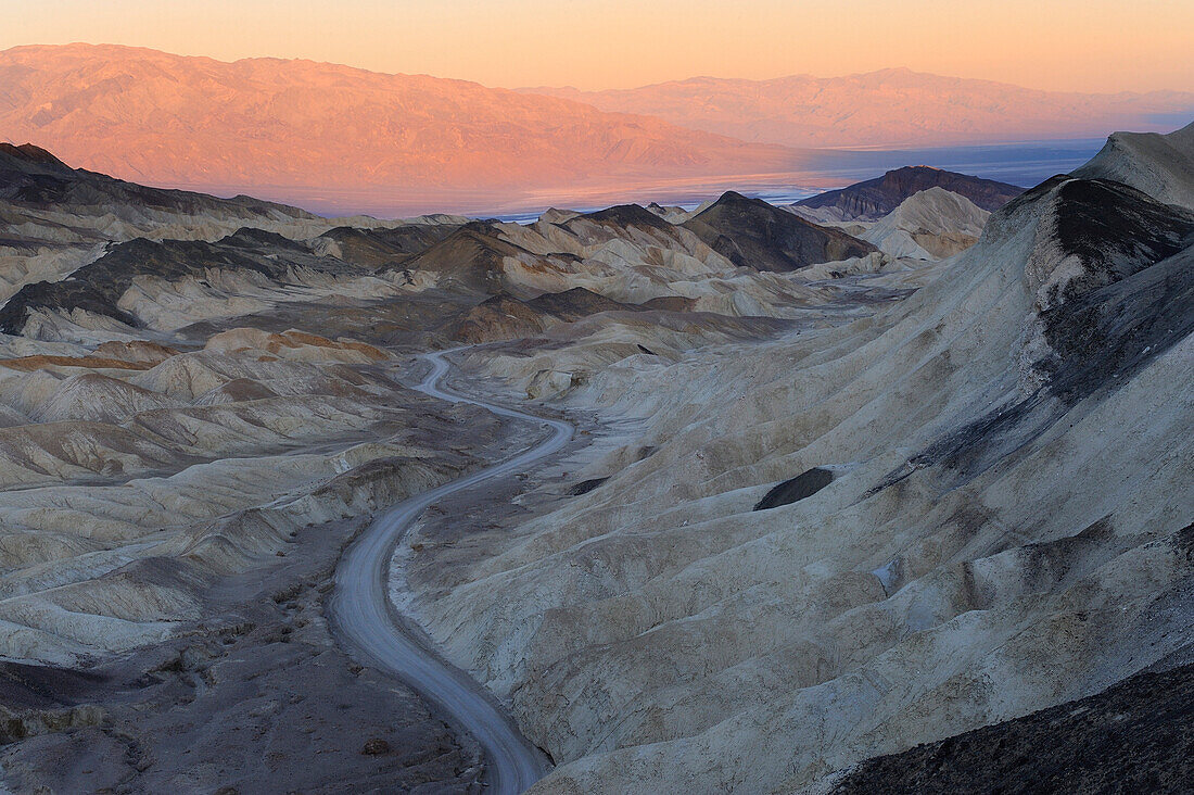 BADLANDS ALONG 20 MULES DRIVE, SUNRISE, DEATH VALLEY NATIONAL PARK, CALIFORNIA, USA