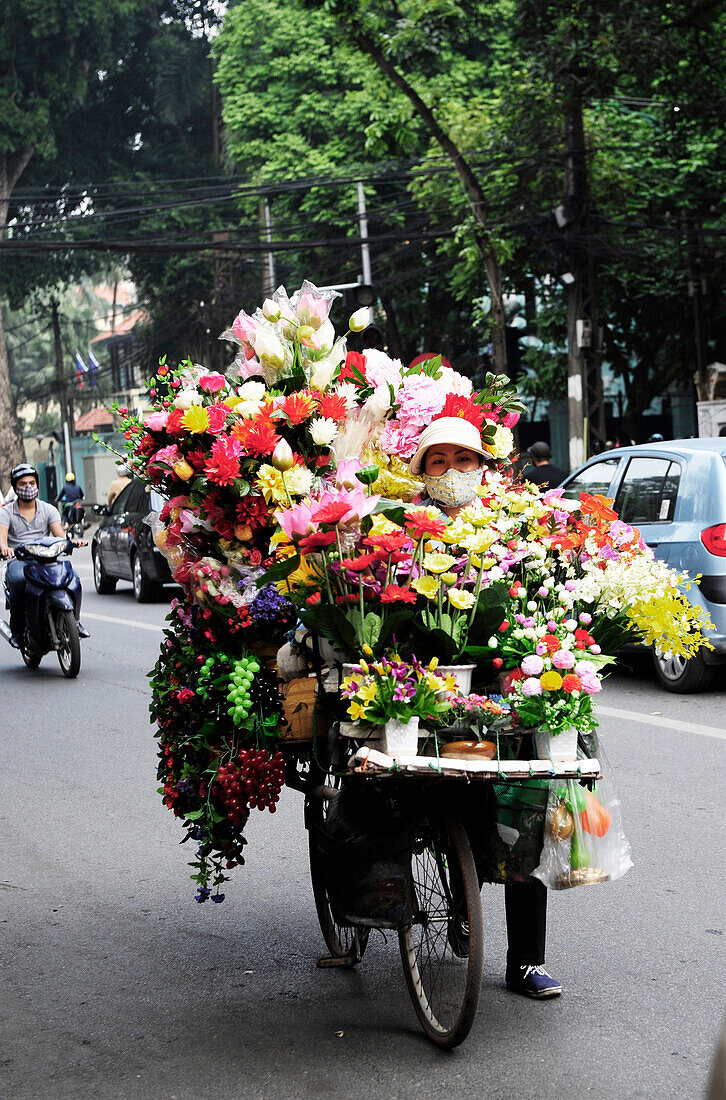 A mobile florist in Hanoi, Vietnam, South East Asia, Asia