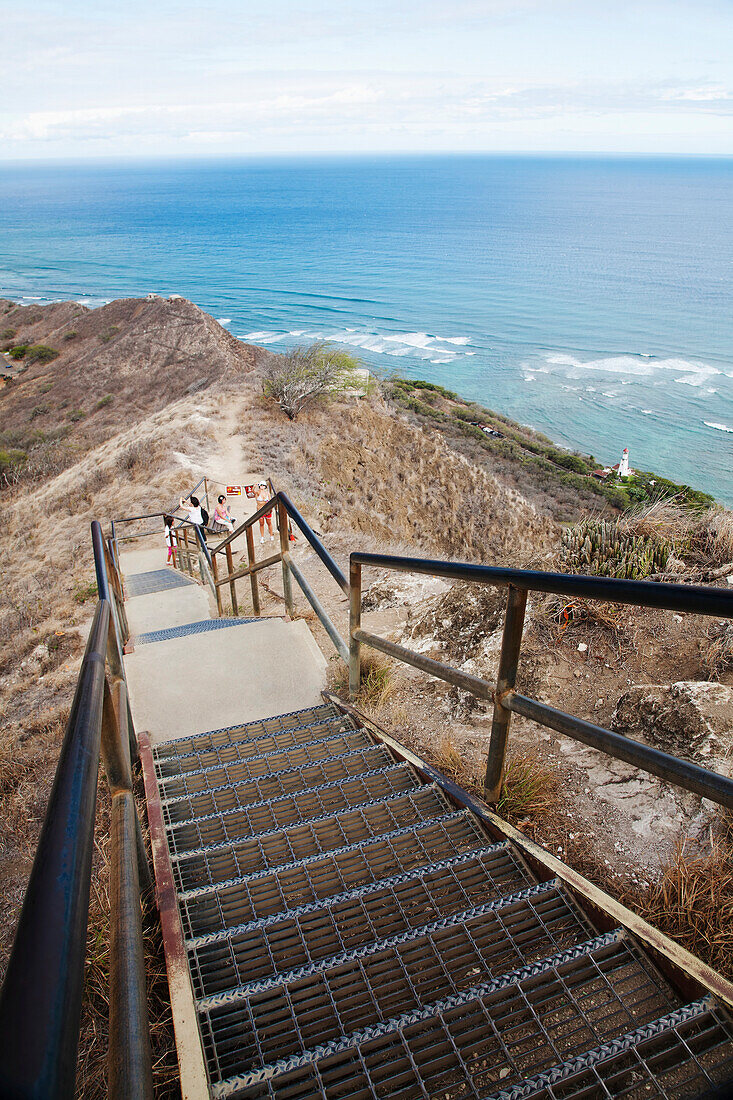 'Stairs leading down to a ridge overlooking the ocean; Honolulu, Oahu, Hawaii, United States of America'